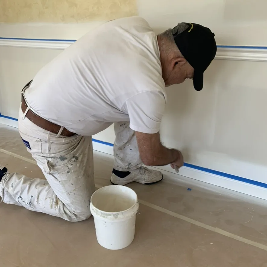American Town Painting cutting in baseboard