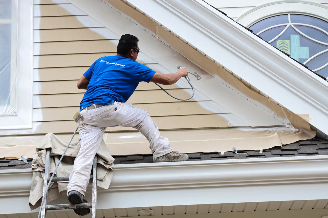 American Town Painting spraying gable roof
